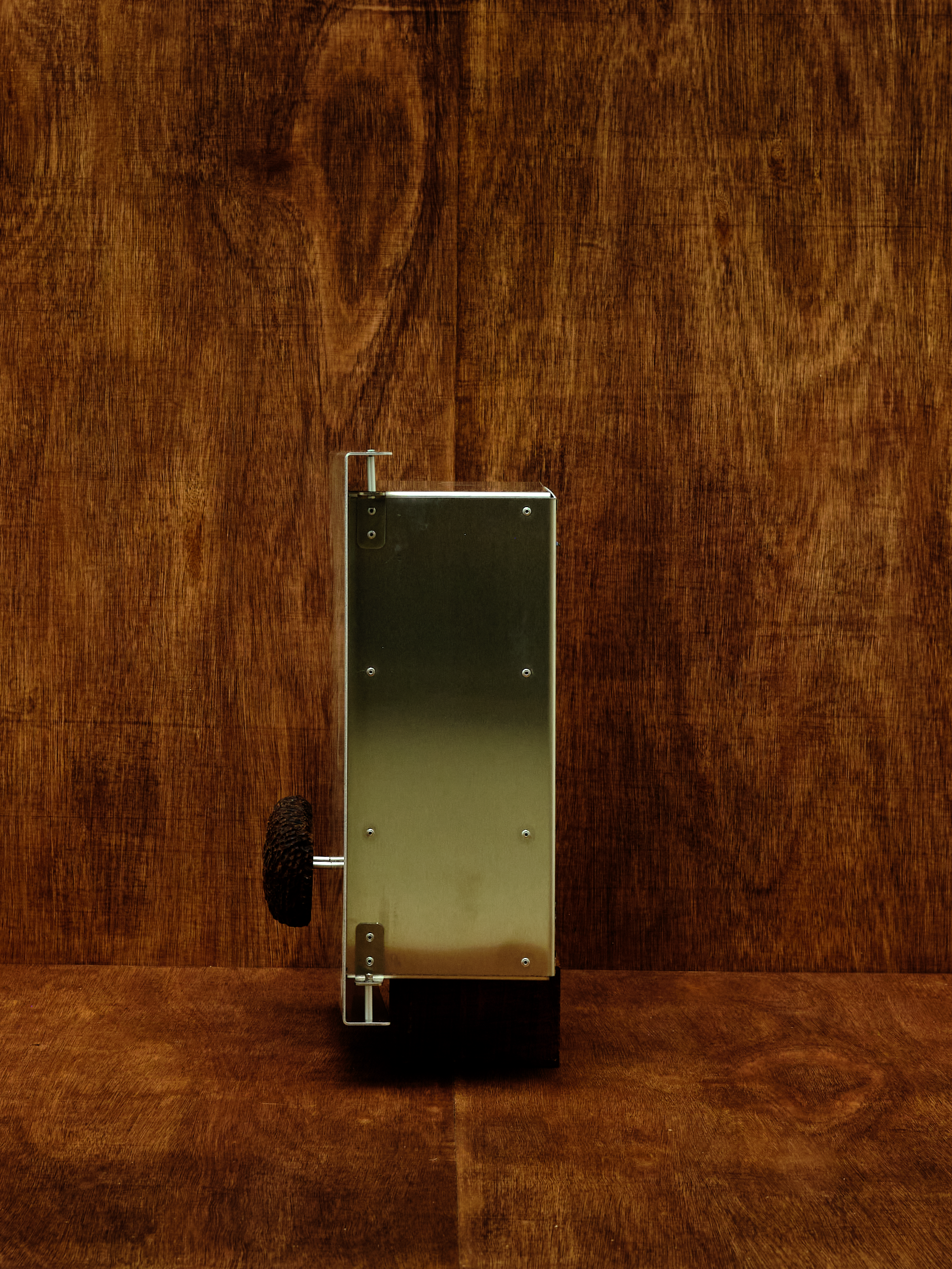 Metallic cabinet on a wooden surface